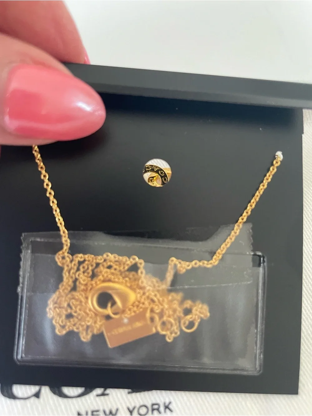 COACH Gold Interlocking Ring Pendant Necklace
